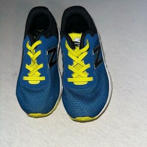 New Balance Kids Size 8 Blue and Yellow Sneakers.